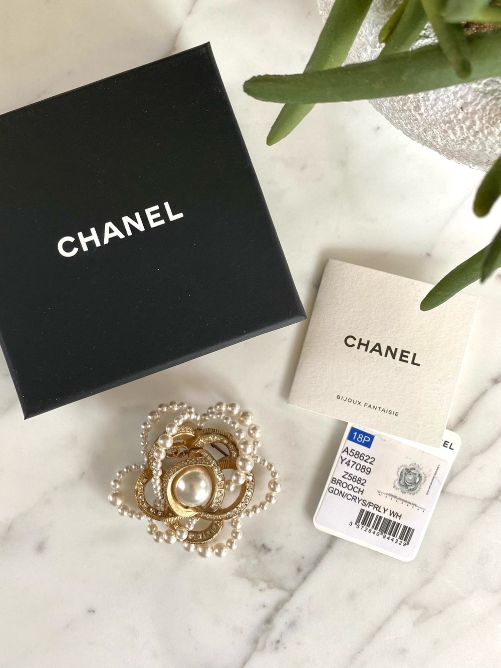 CHANEL - Gold, Crystal & Pearl Camellia Flower CC Brooch 2018